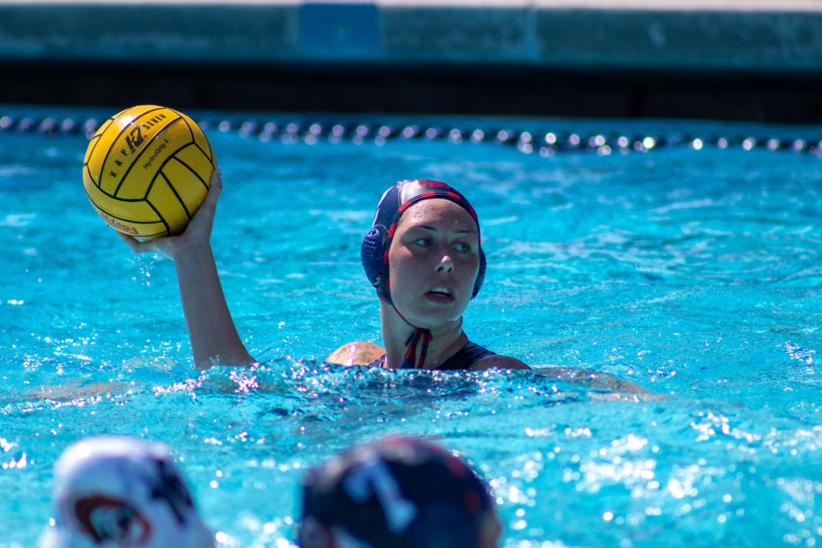 Senior attacker Hailey Andress eyes the net during a game against the Pacific Tigers on March 28 at the Fresno State Aquatics Center. 