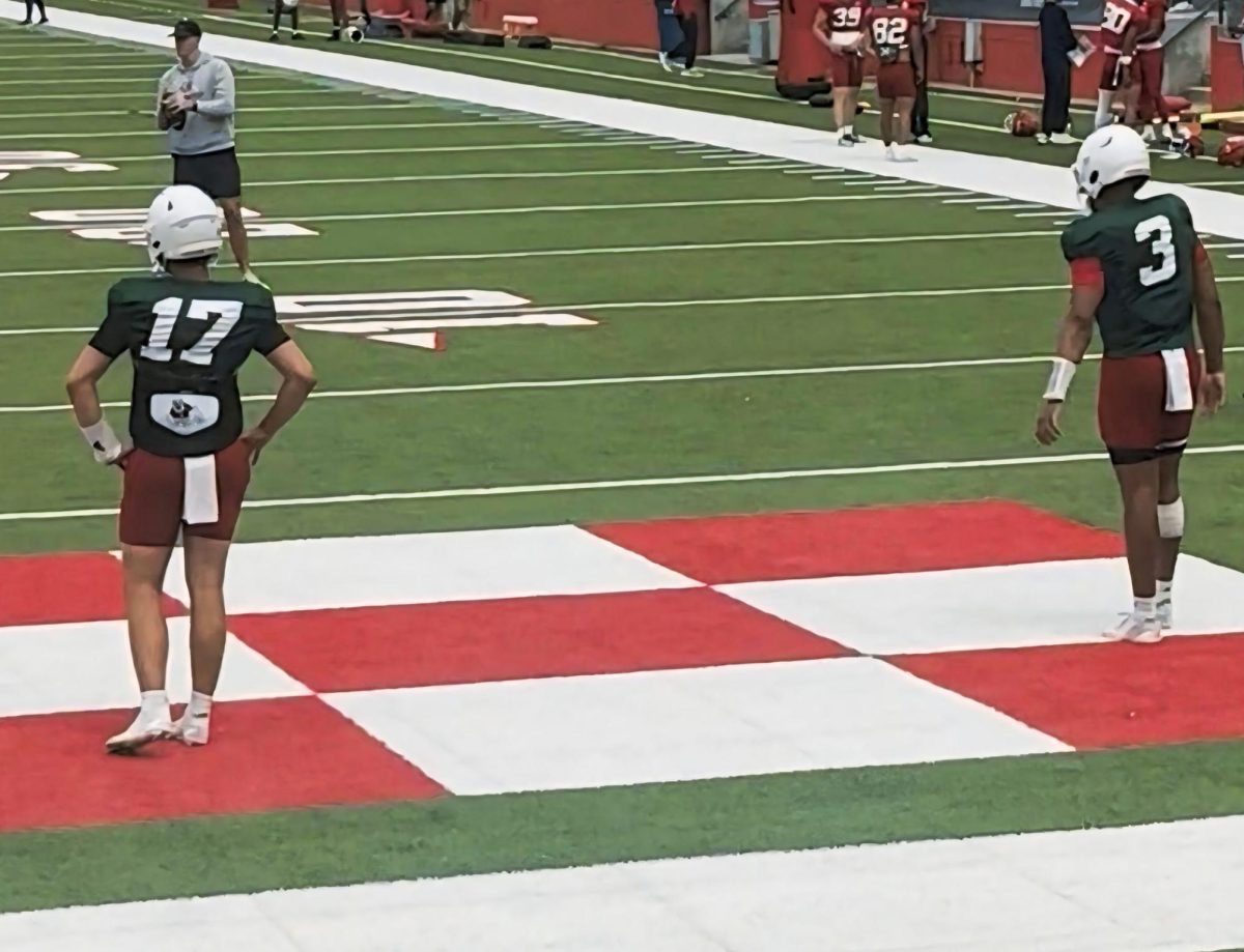 Quarterbacks Deagan Rose (17) and Khristian Martin (3) throw passes during the Fresno State Spring Showcase at Valley Children's Stadium on April 25.