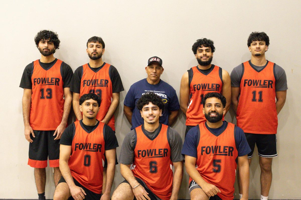 Team Fowler of the PBA Olympics poses for a photo on April 4 at Justin Garza High School. 