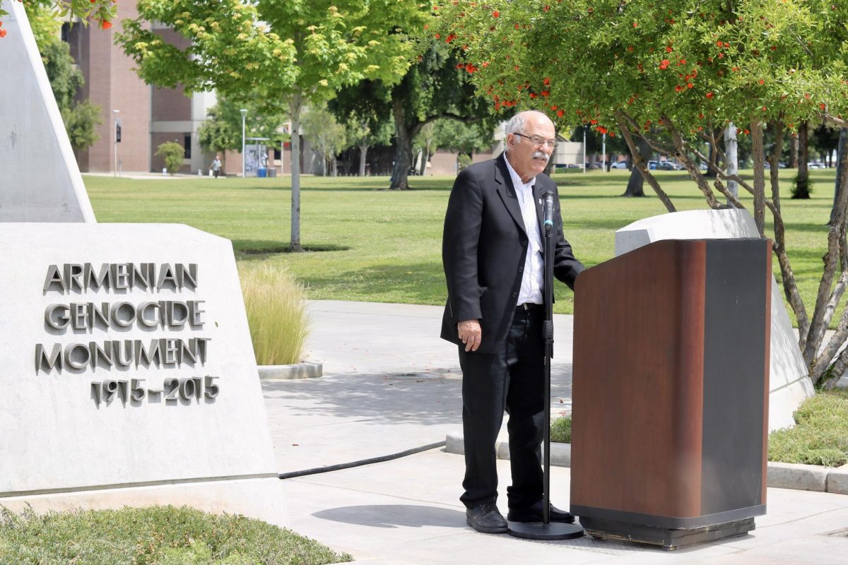 Professor Barlow Der Mugrdechian gives a speech at the afternoon  Armenian Genocide commemoration ceremony. 