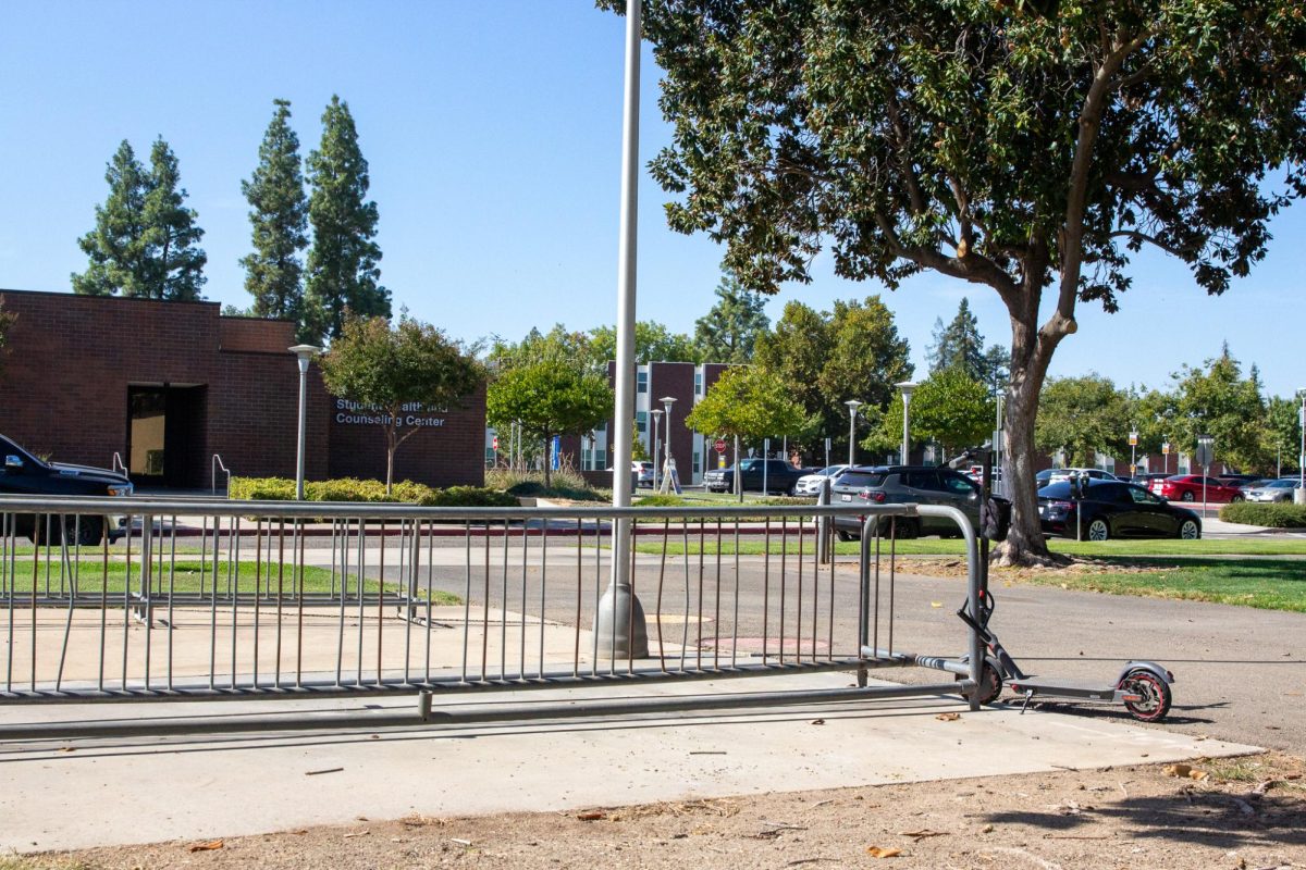Scooter racks near the Student Health and Counseling Center.