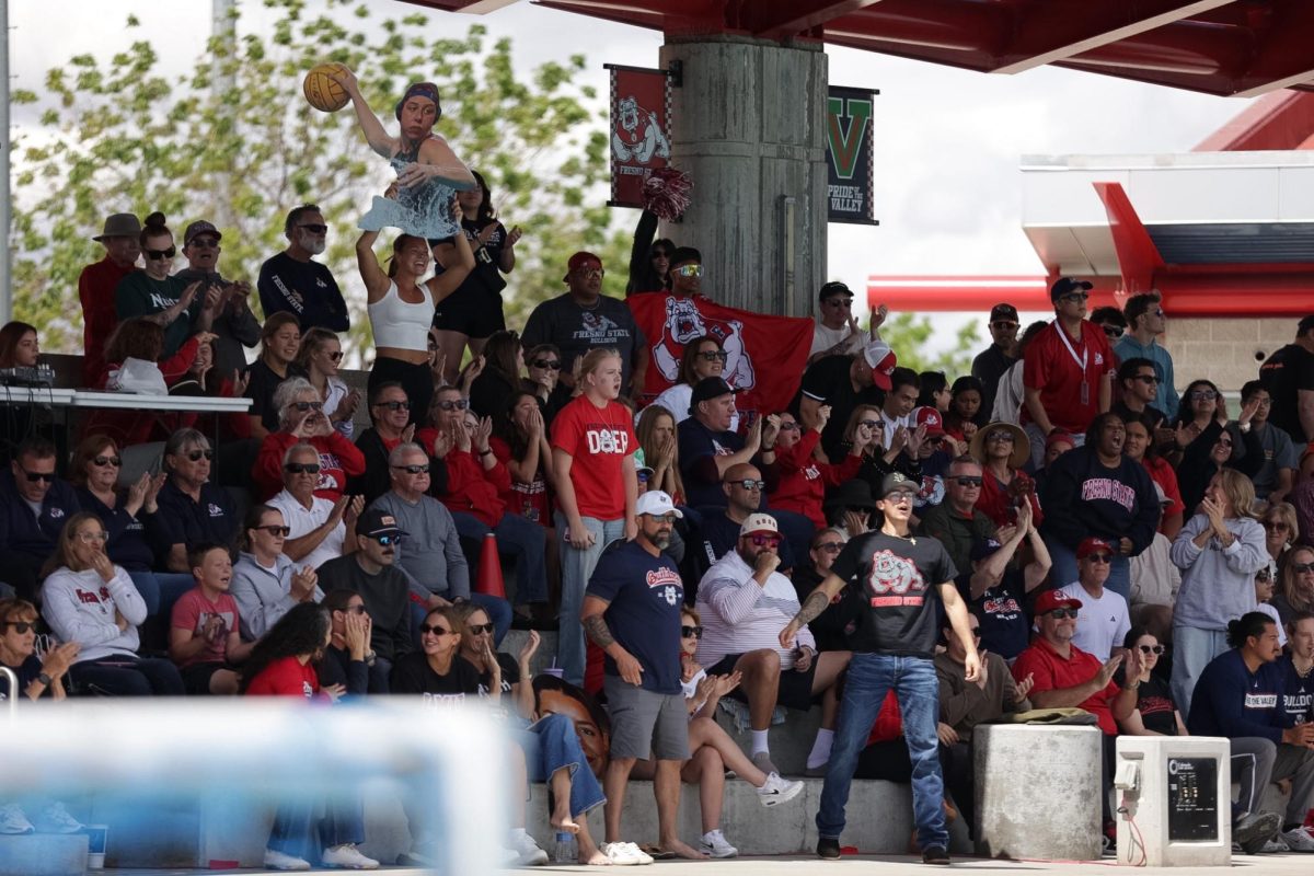The crowd at the Aquatics Center reacts to a goal.