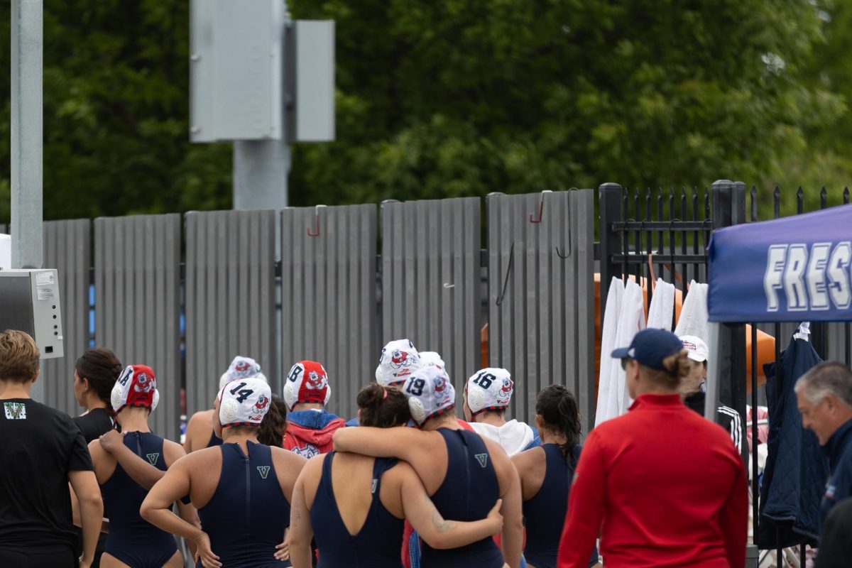 The Fresno State water polo team walks away from the pool after losing to the Loyola Marymount Lions in the GCC Championship game on April 12 at the Fresno State Aquatics Center.