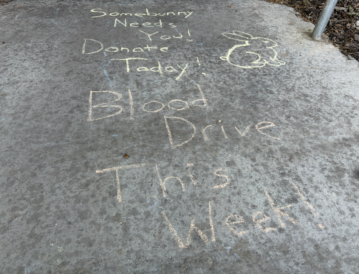 Chalk drawn on campus advertising the blood drive on April 13.