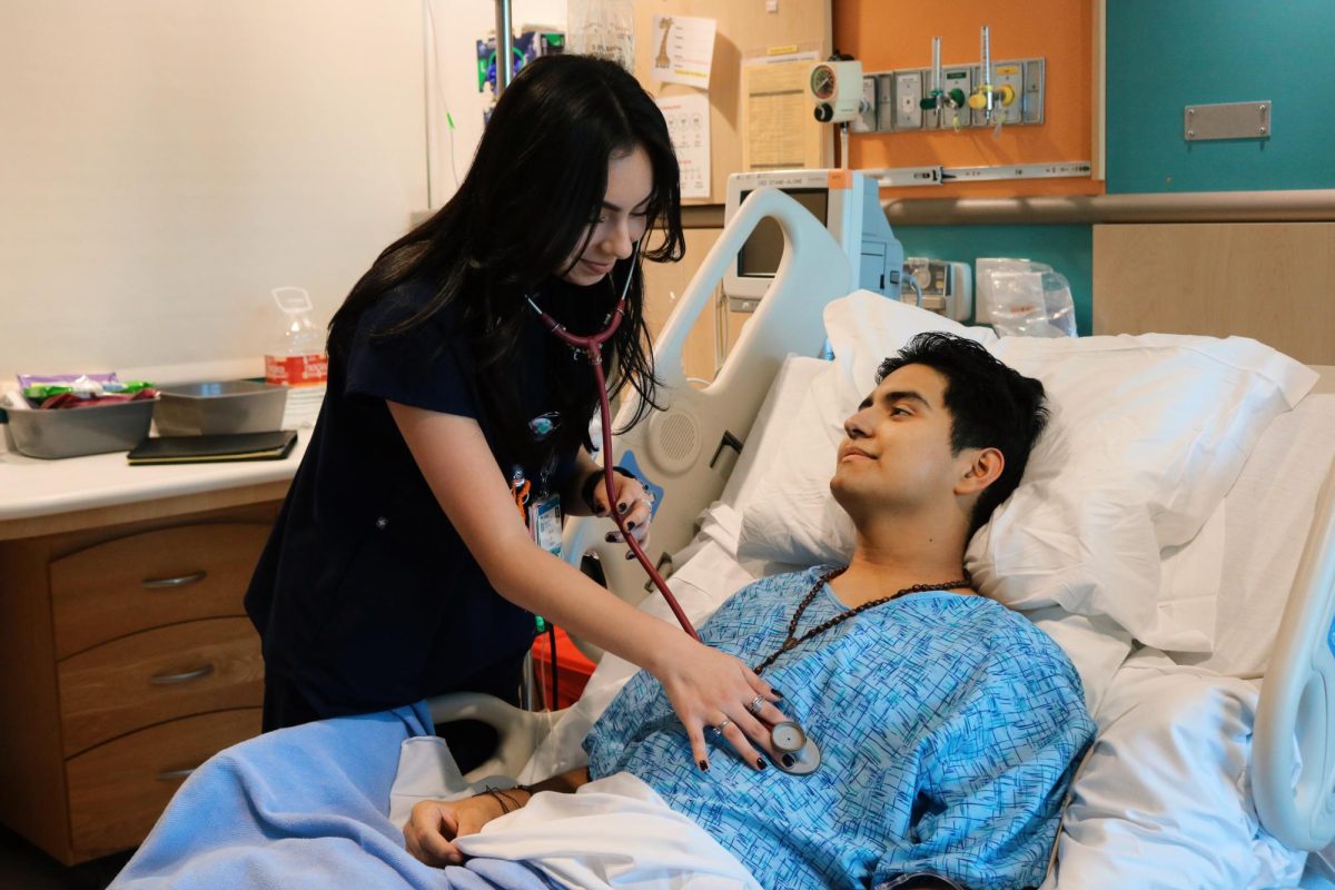 A Valley Children's Hospital nurse checks Joshua's vitals. 