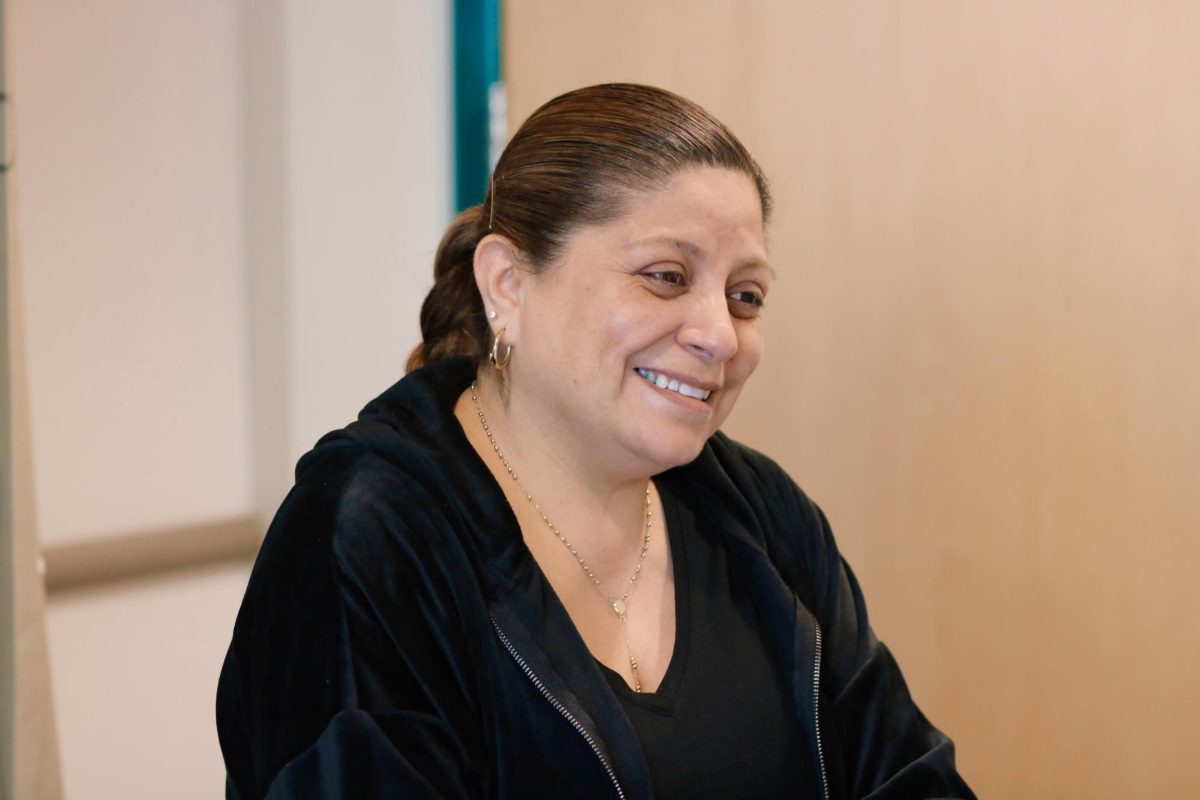 Joshua's mom, Monica, smiling at her son. 