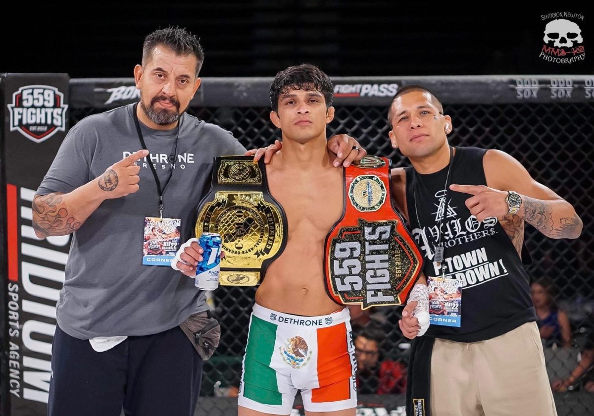 Luis Ramos after retaining the CAMO and 559 bantamweight titles against Noah Ozuna.