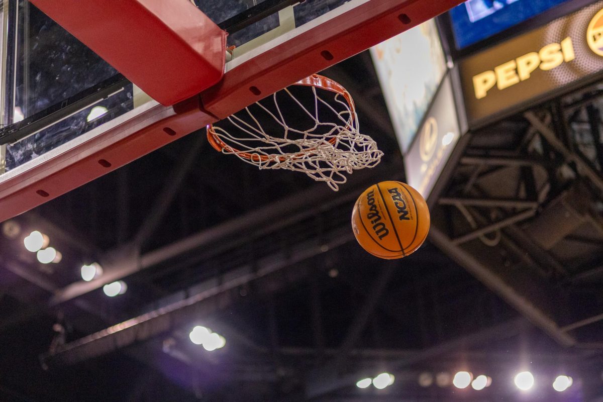 A basketball being thrown into the hoop at a men's basketball game vs. the Grand Canyon Lopes on Jan. 24. 